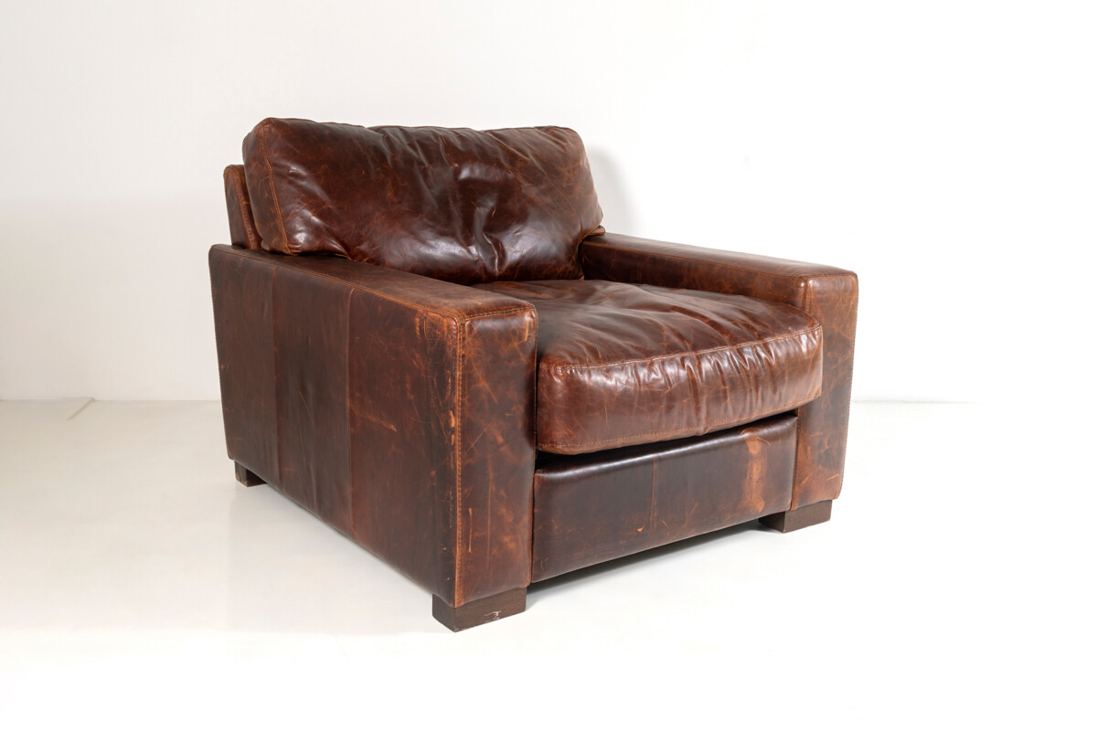 A large Contemporary Brown Leather Armchair By Roche Bobois
