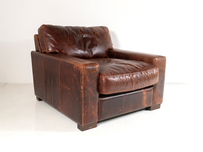 A large Contemporary Brown Leather Armchair By Roche Bobois