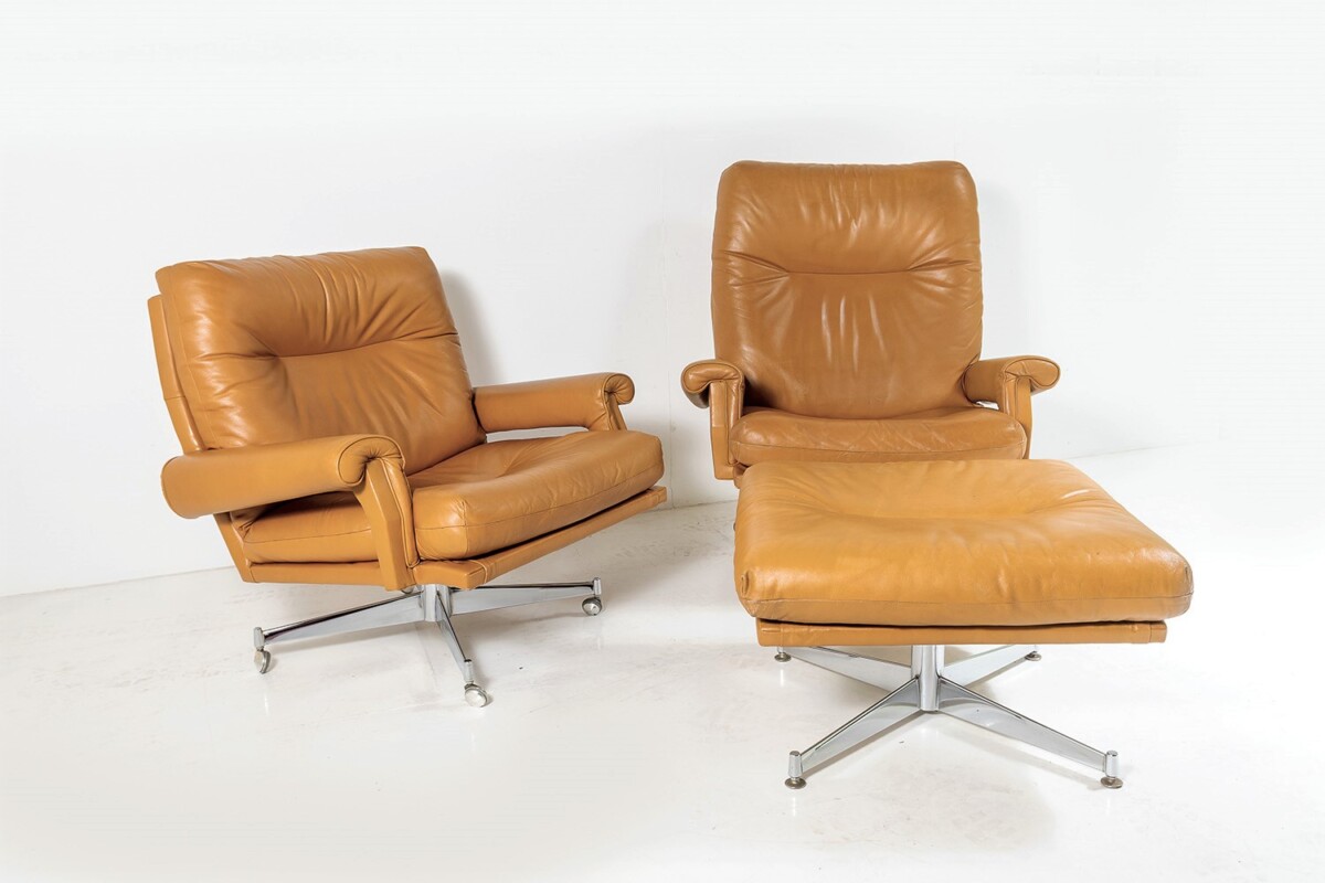 A Pair of 1960s Mid Century Howard Keith Tan Leather Swivel Chairs with Footstool on Chrome Base