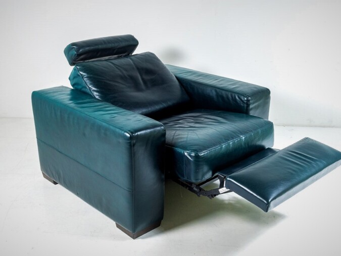 A Vintage 1980s Brutalist Green Leather Recliner Armchair