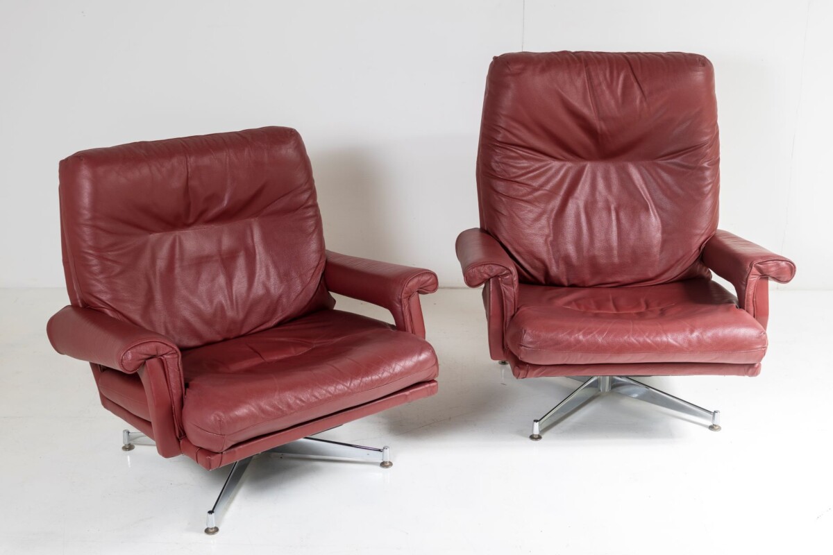 A Pair of 1960s Mid Century Howard Keith Leather Swivel Chairs on Chrome Base