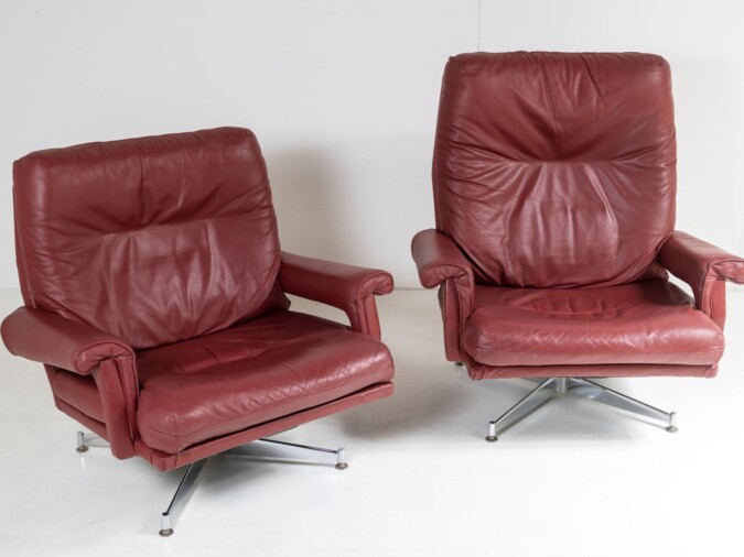A Pair of 1960s Mid Century Howard Keith Leather Swivel Chairs on Chrome Base