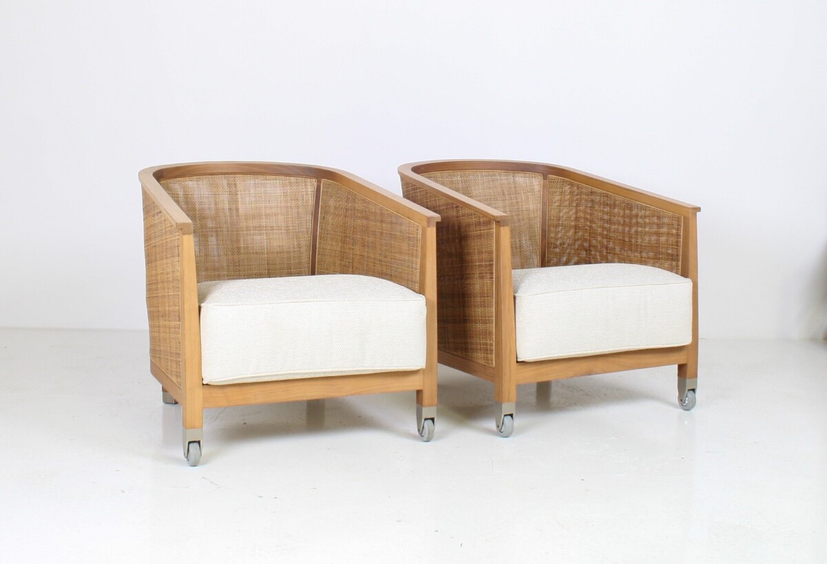 A pair of 'Mozart' Woven Rattan Italian Lounge Armchairs By Flexform