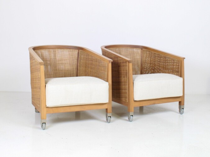 A pair of 'Mozart' Woven Rattan Italian Lounge Armchairs By Flexform
