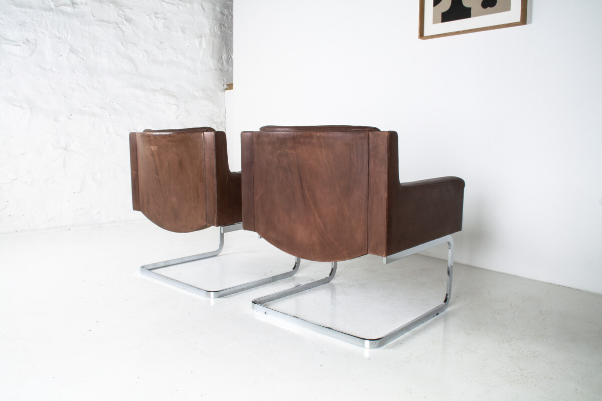 A Pair of Robert Haussmann for De Sede DS-201 Mid Century Brown Leather Armchairs - Image 7