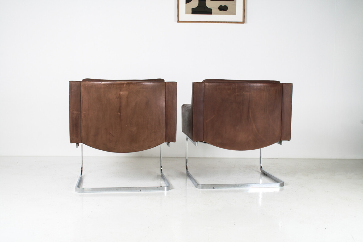 A Pair of Robert Haussmann for De Sede DS-201 Mid Century Brown Leather Armchairs - Image 6
