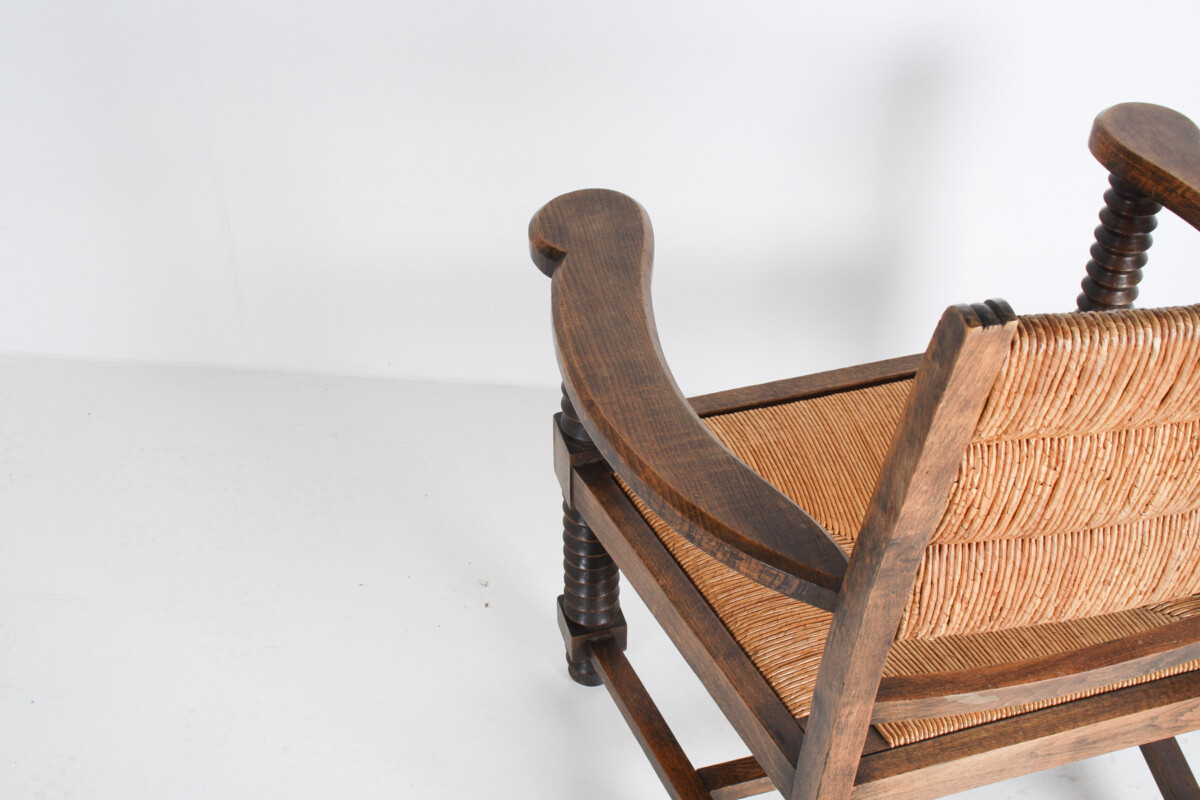 A 1950s Oak Corkscrew Armchair with Straw Seat attributed to Charles Dudouyt - Image 9