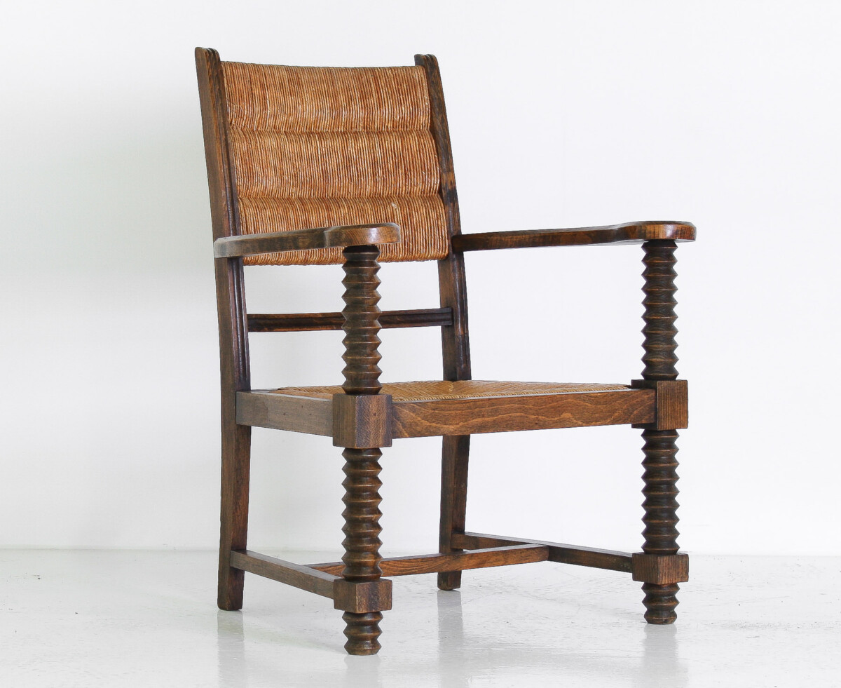A 1950s Oak Corkscrew Armchair with Straw Seat attributed to Charles Dudouyt - Image 4