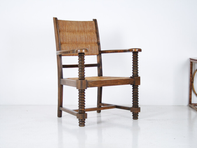 A 1950s Oak Corkscrew Armchair with Straw Seat attributed to Charles Dudouyt