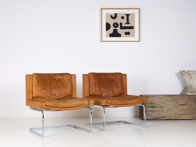 A Pair of Robert Haussmann for De Sede DS-201 Mid Century Tan Leather Chairs