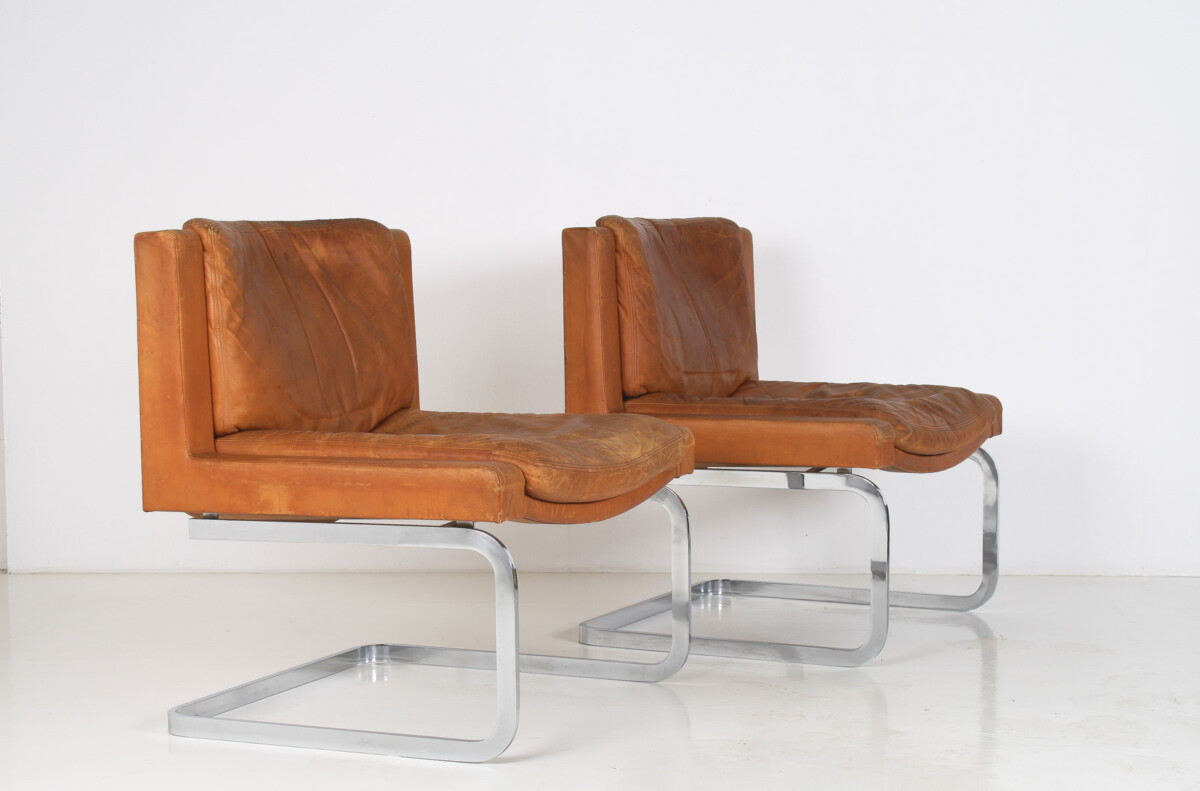 A Pair of Robert Haussmann for De Sede DS-201 Mid Century Tan Leather Chairs - Image 2