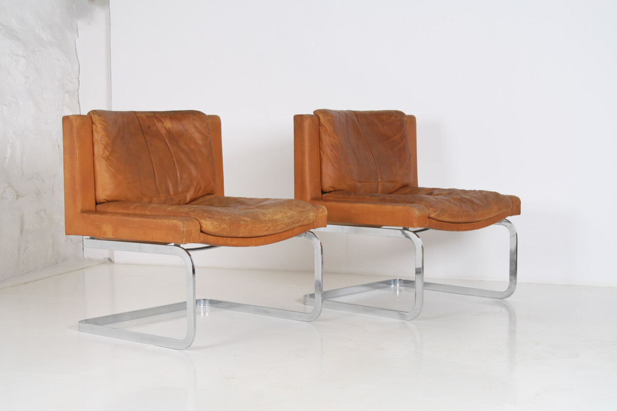 A Pair of Robert Haussmann for De Sede DS-201 Mid Century Tan Leather Chairs - Image 23