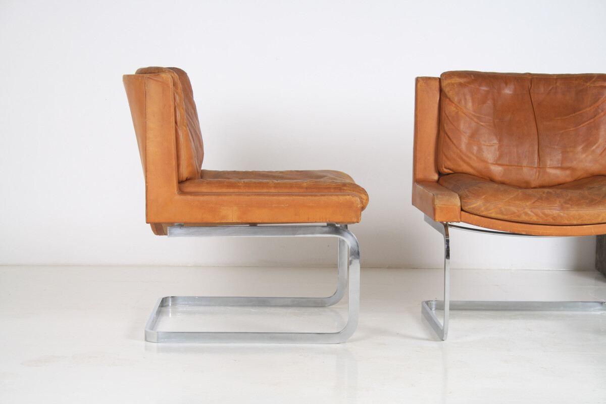 A Pair of Robert Haussmann for De Sede DS-201 Mid Century Tan Leather Chairs - Image 4